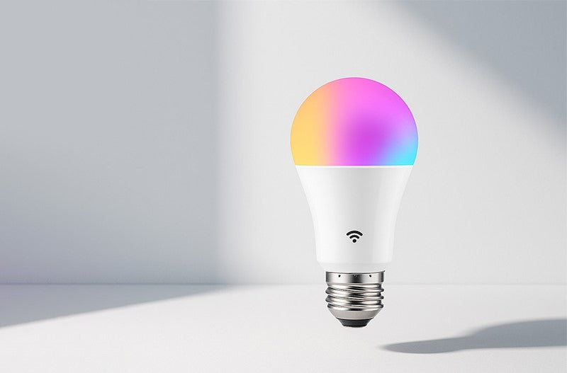 Smart light bulb with multicolored hue on a white background