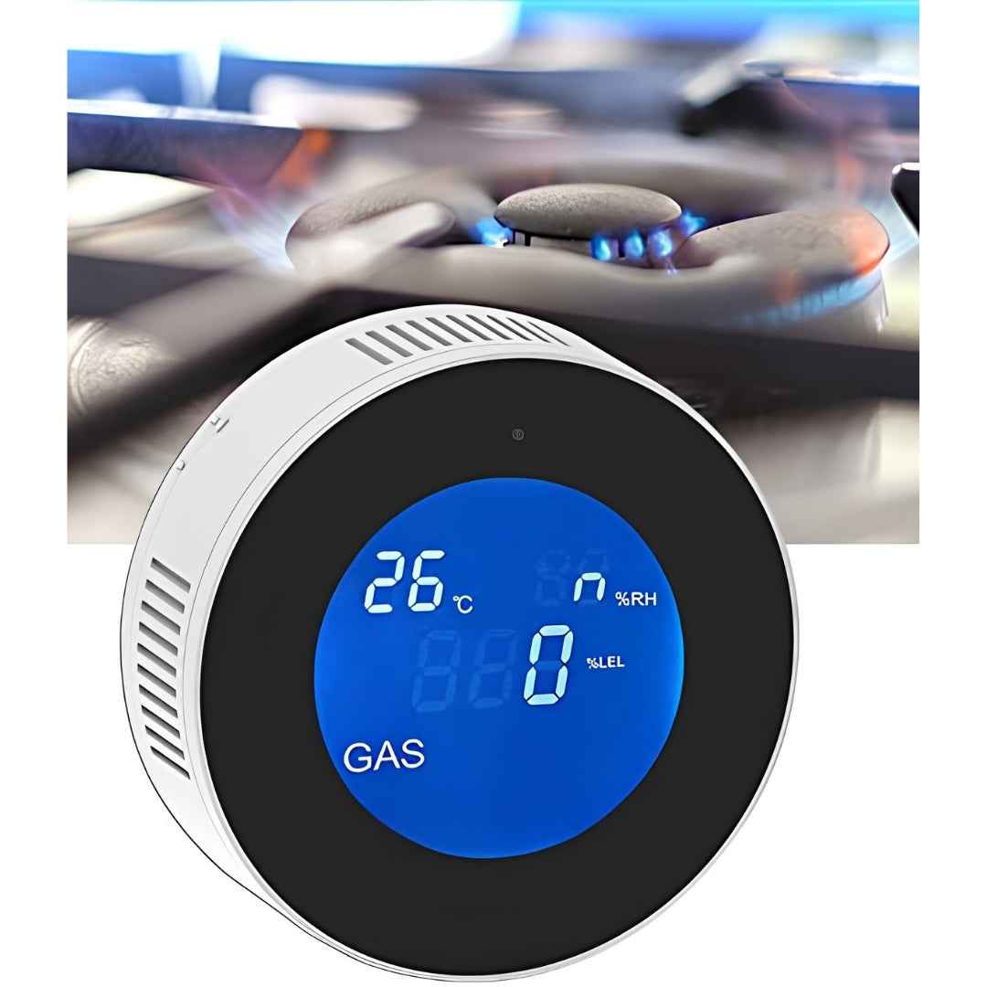 Smart WiFi Gas Leak Detector placed in front of a kitchen stove top with active blue gas burner flames.