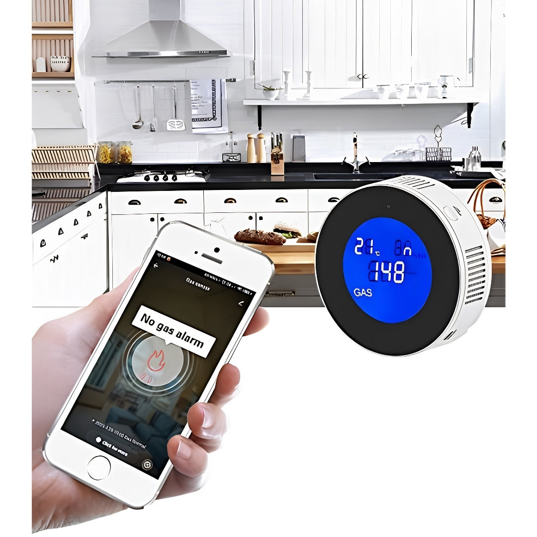 Smartphone app showing a safe status next to a Smart WiFi Gas Leak Detector in a modern kitchen setting.